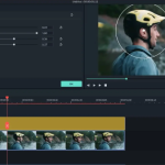 Filmora editor showing tilt-shift circle effect applied on video clip of cyclist